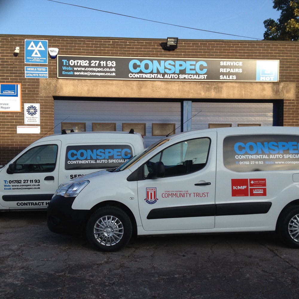 Conspec liveried vans parked outside the Conspec workshop on Hulton Street, Hanley